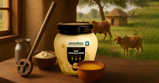 Traditional Indian kitchen with bilona ghee, wooden churner, and desi cow in rural background