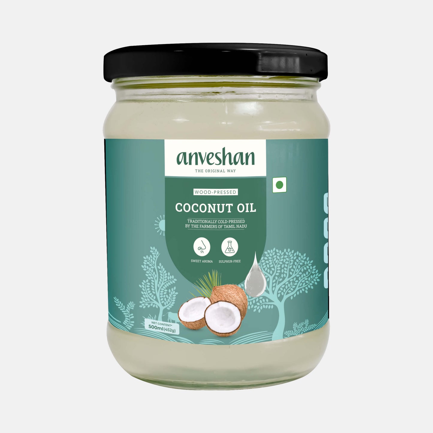 Anveshan wood-pressed coconut oil 500ml jar with green label and coconut illustrations
